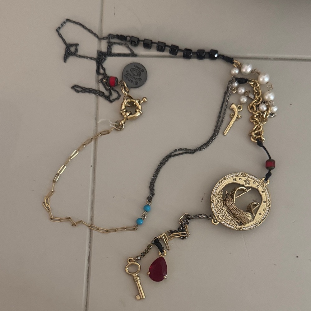 Disney Couture Gold and Black Pirates of the Caribbean necklace